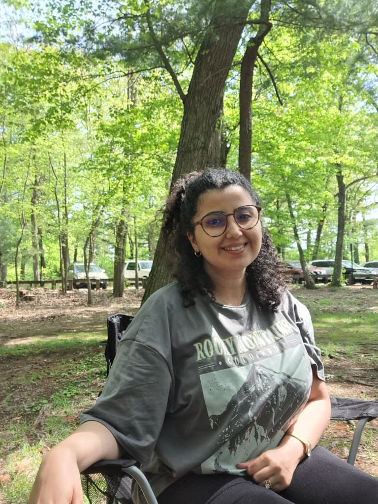 Fadma Belkhouraf smiling outdoors